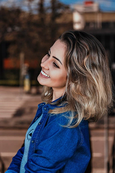 woman smiling after her cosmetic dentistry procedure